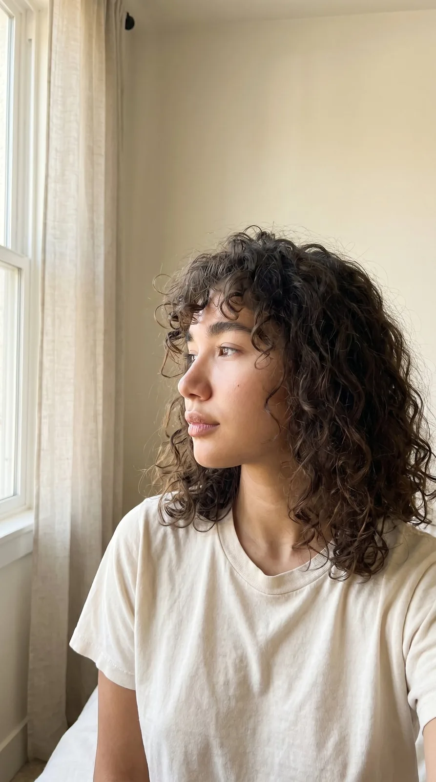 The same face, by the window